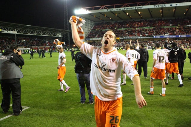Skipper Charlie Adam celebrates with the Pool fans