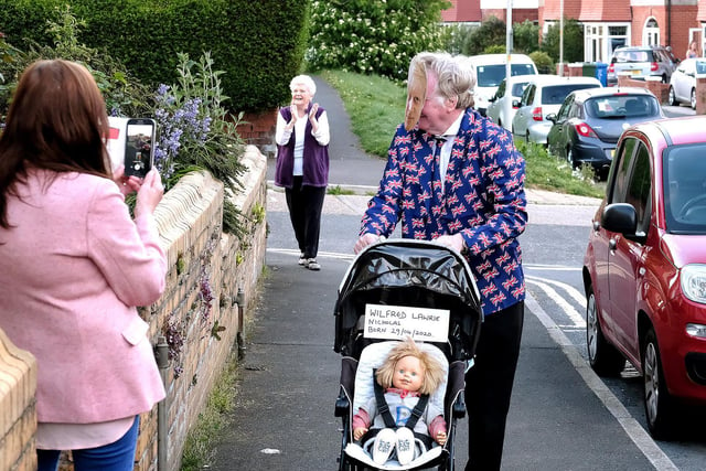 Have you met my new son? Boris Johnson, also known as Nigel Cunningham, introduces the latest arrival to his neighbours in Mayville Avenue, Scarborough