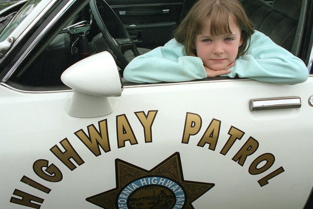 1999 - Lauren Wadsworth (7) at a car show in Little Singleton in a 1981 Chevrolet highway patrol car
