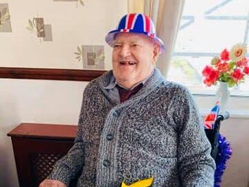 A resident at The Sands care home enjoys VE Day celebrations.