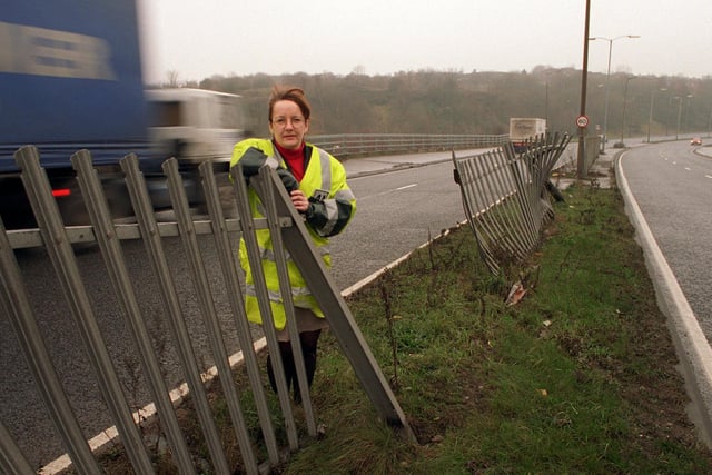 January 1996 and these damaged crash barriers on the central reservation of Stanningley Bypass were cause for concern. Pictured is Denise Thorley of the Automobile Association.
