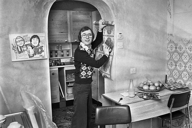 Comedian Syd Little of comedy duo Little and Large fame, decorating his new house in Atherton in January 1977.  Syd, whose real name was Cyril Mead, was a painter and decorator before teaming up with his comedy partner and had just moved into the area at the height of their fame.