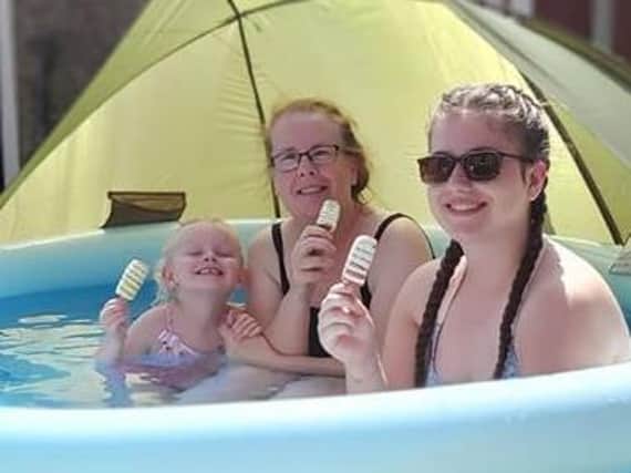 Esther Tomkins enjoying the pool and an ice lolly with Alysia and Chloe.