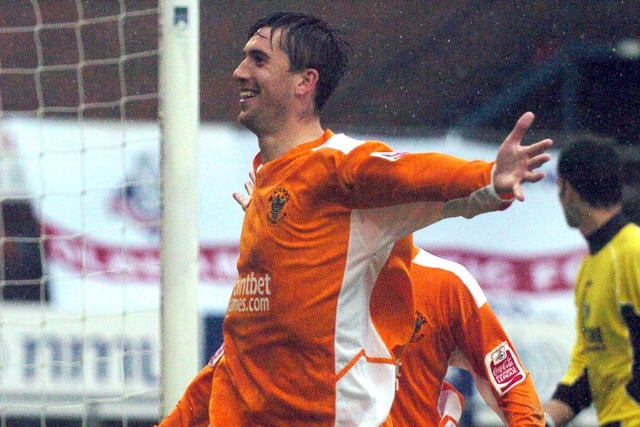 Shaun Barker celebrates his goal in front of the Blackpool fans