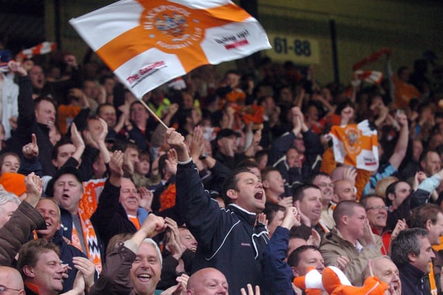 Blackpool fans celebrate their first leg win