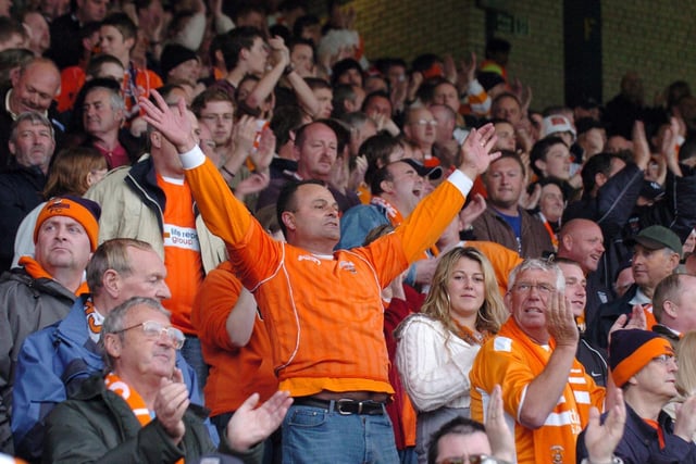 Blackpool fans celebrate their first leg win