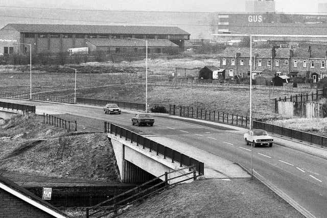 A view across Scot Lane towards Martland Mill village, Wigan Newspapers Limited centre and GUS mail order depot in February 1985.