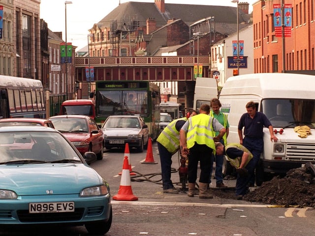 June 1996 and repairs were underway after a water main burst at the junction of Briggate and Duncan Street.