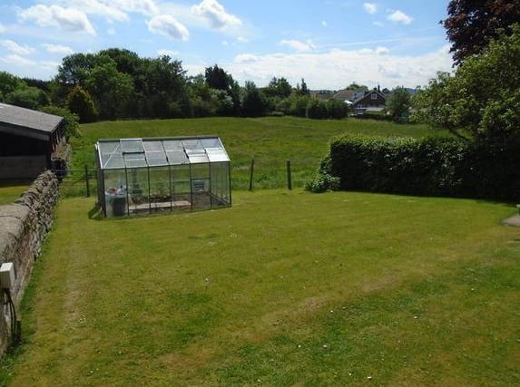 This three bedroom detached farm house, for sale with Hunters, is set within two acres of south facing land. This property also includes a two bedroom detached cottage with garage and excellent potential for holiday letting.