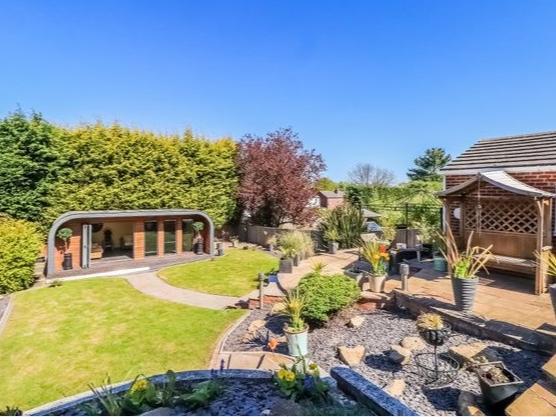 This three bedroom, two bathroom detached house for sale in Thornes for  offers over 400,000. And it comes with its own garden pod.