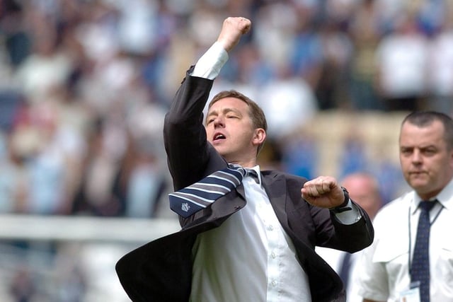 Billy Davies punches the air after PNE's first-leg win over Derby