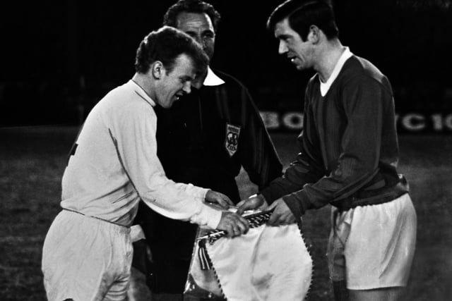 Billy Bremner and John Greig swap pennants ahead of the quarter-final first leg at Ibrox. The game finished 0-0 with the Whites winning the return leg 2-0 to progress.