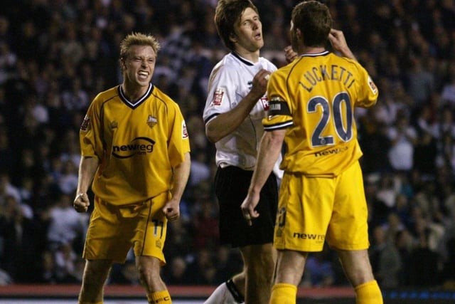 Preston's Chris Lucketti and Chris Sedgwick make their feelings known to Grzegore Rasiak after the Derby striker misses his penalty