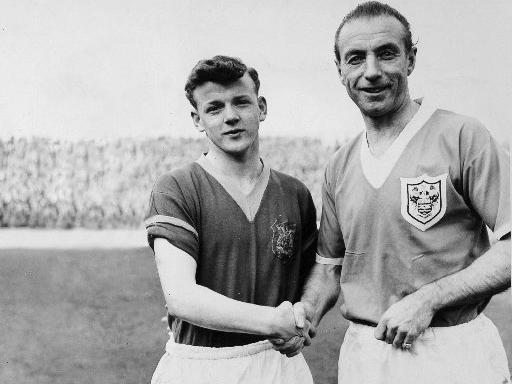 Billy Bremner shakes hands with Stanley Matthews ahead of a League Cup tie.