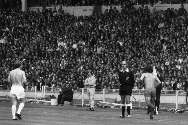 Referee R Matthenson sends off Billy Bremner and Kevin Keegan after the pair traded punches during the Charity Shield.