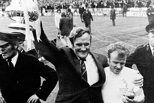 Don Revie and Billy Bremner celebrate winning the FA Cup.