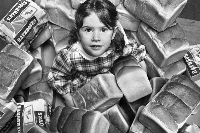 In amongst the loaves is Katy Rathbone, four, daughter of production director Roger Rathbone.