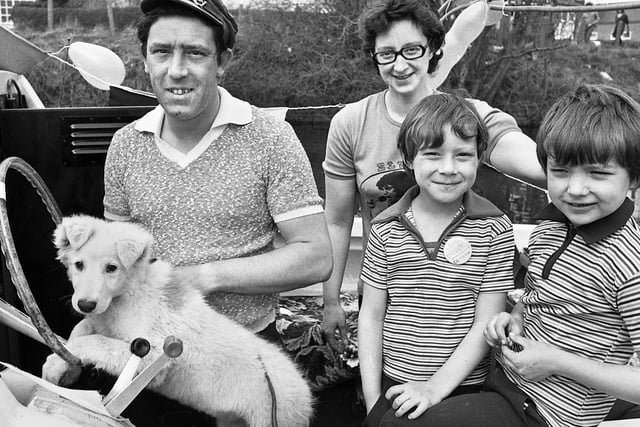 The Ratcliffe family and dog Lassie, from Scot Lane, Newtown, on their cruiser enjoying the Appley Bridge Boat Rally on Saturday 5th of April 1980.
The boat rally was a popular event for many years and organised by the Douglas Valley Cruising Club over the Easter weekend.