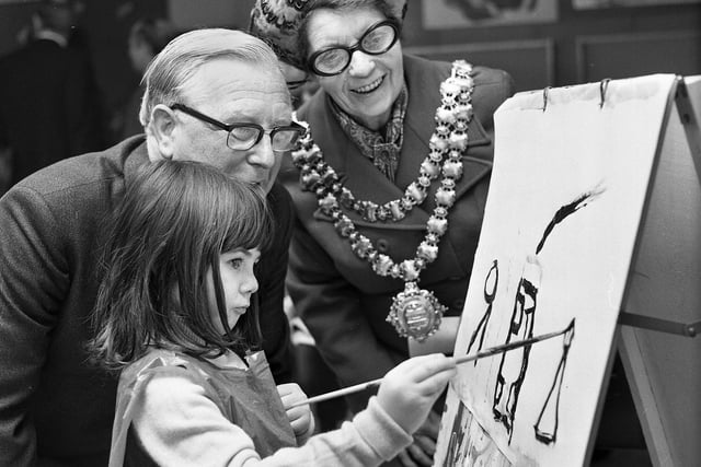 The Mayor of Wigan, Coun. Ethel Naylor, and Coun. Ernest Cowser with 6 year old pupil, Amanda Jane, at Winstanley Primary School after the official opening on Wednesday 22nd of November 1972.