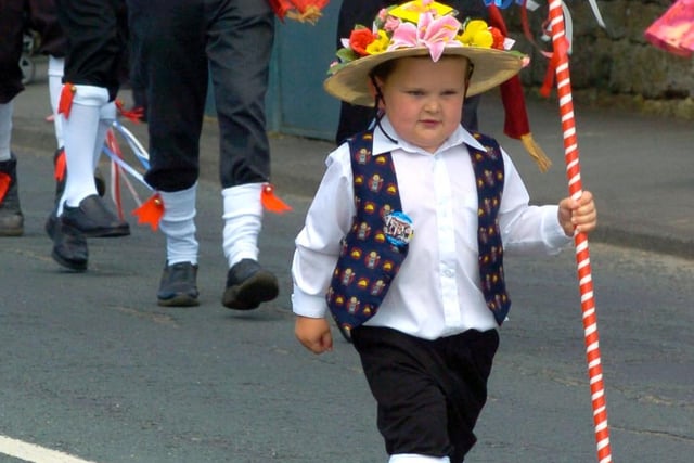 Harry Smith, five, leads the Boddington Bells Morris Dancers from Churchtown at the Catterall Gala