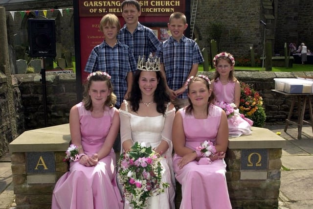 Donna Clifford (centre) and Charlotte Smith, 12, gala queen at St Helens Church patronal festival in Churchtown 2004