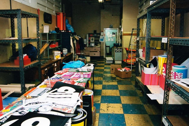 The display office, taken at the time of the store's closure in May 2005. Various promotional materials are still laid out on a long table on the left, including tickets advertising 50% off, 40% off, 30% off etc.