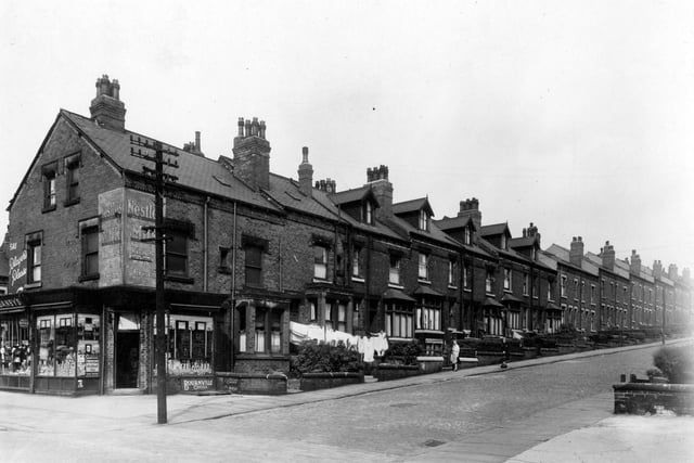 A view looking north-east up Ashton Terrace from Harehills Road. The shop on the corner is S. Clayton and Son, grocers.