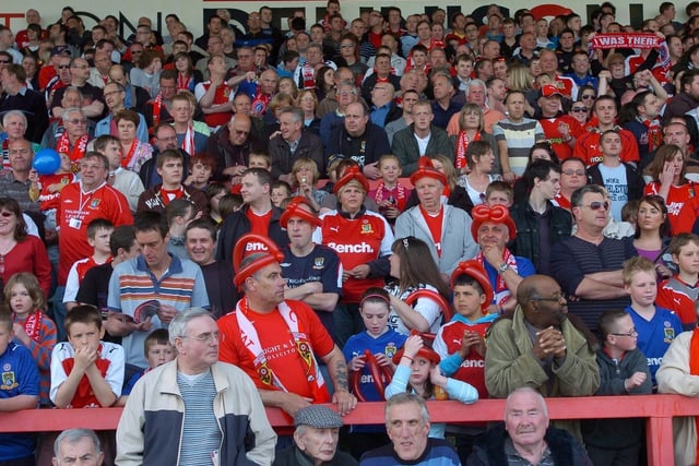 Morecambe fans in the North Stand at Christie Park