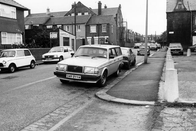 Cowper Road. The first junction is with Cowper Terrace, then Cowper Mount and Harehills Lane, after which Strathmore Avenue follows on from Cowper Road in the distance.