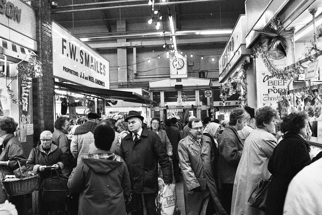 A busy scene at the old Wigan market hall in December 1987.
