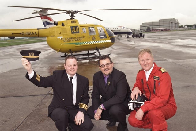 North West Air Ambulance patron Jeremy Spake, who starred in the TV docusoap Airport. Pictured (centre) enroute to Blackpool to mark the ambulance's second birthday, with Captain Colin O'Neill, of British Regional Airlines (left), and NW Air Ambulance pilot Mike Buckley (right).