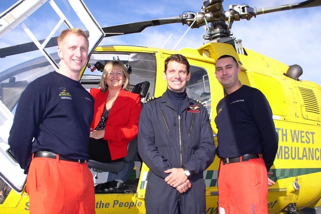 Fundraising is vital to keep the Air Ambulance operating such as thisfunding  presentatiion in 2005. Pictured left to right: Nick Sutcliffe  (paramedic), Joan Halse (Thwaites), Phil Merritt (pilot) and Lee  Winterbottom (paramedic)