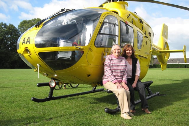Doreen Rigby and daughter Viv Greenwood managed to have a photo taken when the Air Ambulance landed in Bamber Bridge. Doreen had asked for donations to the Air Ambulance for her 80th birthday, raising 760