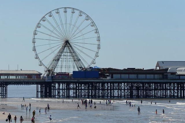 Central Pier's Big Wheel looks down on bathers