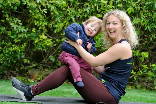 Nina Meads enjoying some exercise in the garden with son Luca.