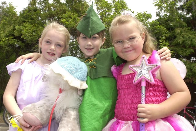 Peter Pan alias Lyndsey Hayes, aged seven, with Wendy and Tinkerbell, Vicki Riding (six) and Katie Hall (six) do their magic at Hambleton Gala
