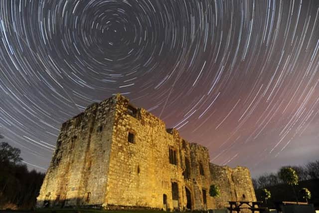 Star Trails over Barden Tower in Wharfedale. Picture by Bruce Rollinson.