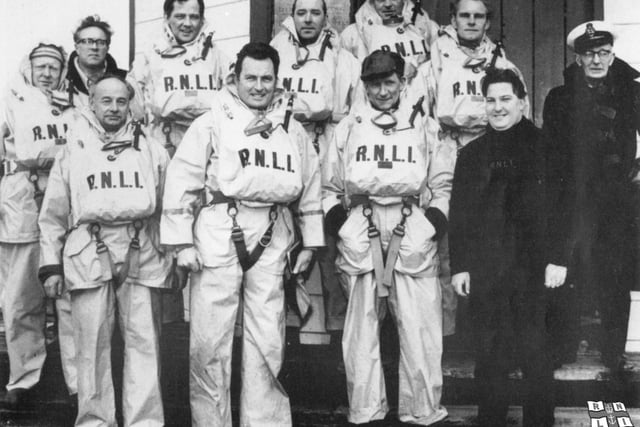 RNLI Fleetwood Crew in 1969 during a station inspection from the R.N.L.I. Pictured are Coxswain Ben Bee with Mr S. Brett, District R.N.L.I. Engineer and Lt. Commander H. H. Harvey, District Inspector for the R.N.L.I.