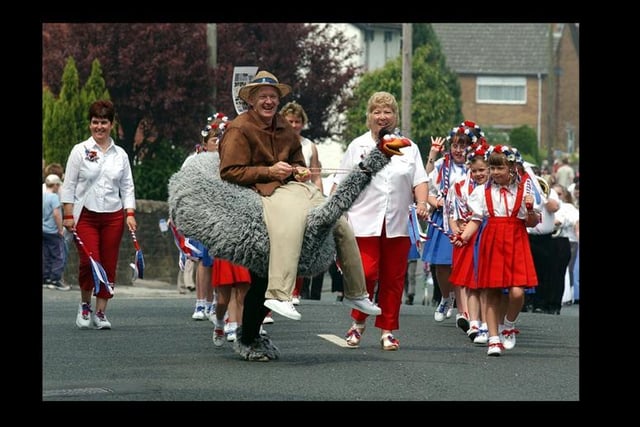 Andy Stewart mucking about in front of Garstang Morris Dancers at Catterall gala in 2003.