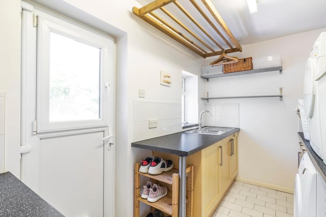 It also has a well organised and handy utility room.
