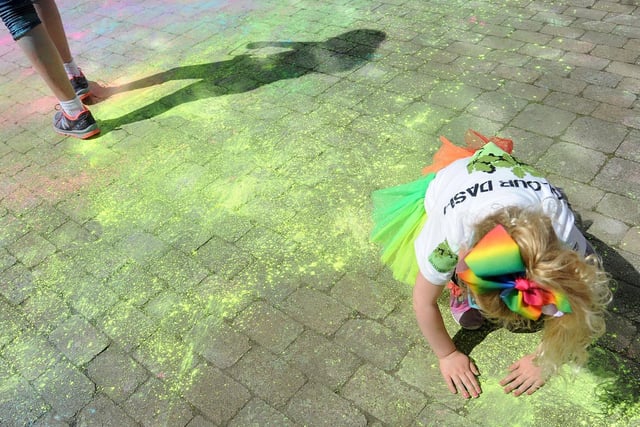 Ellie Bancroft having fun with spilt paint in 2019