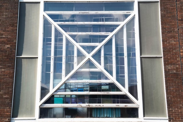 You've probably passed the front of this building countless times, but, have you ever seen this window on the side of it?