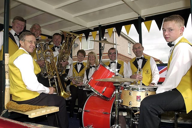 Freckleton Hasbins Brass Band perform from a float during Freckleton Club Day