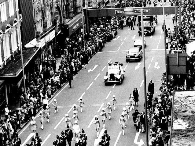 Thousands of people line the route as the Lord Mayor's Parade makes its way up Briggate in June 1980.