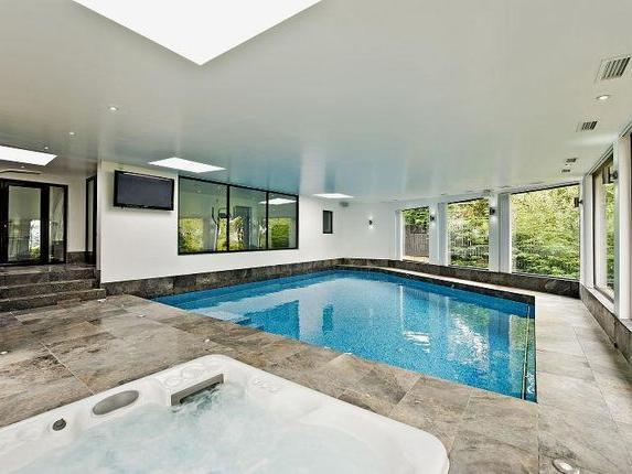 The leisure complex comprises a changing room, heated swimming pool with polished granite tiled walkway and shower area, electric pool cover, Jacuzzi bath/spa pool, Cambridge audio speaker system, air conditioning and a fully automated plant room with boiler and filtration system. Air conditioned gymnasium with integrated sound system, in turn leading to a fully tiled steam room.