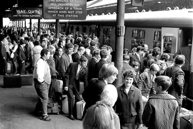 A busy North Western Station 1969 as Wiganers prepare to board the train