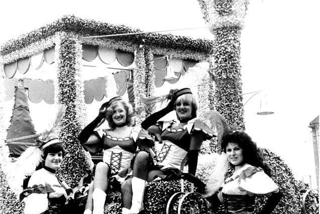 The Lewis's float was decorated with more than 20,000 bows by display staff at the department store. Girls on the float are Kay Milner, Christine Johnson, Lynne Almond and Helen Bentley.