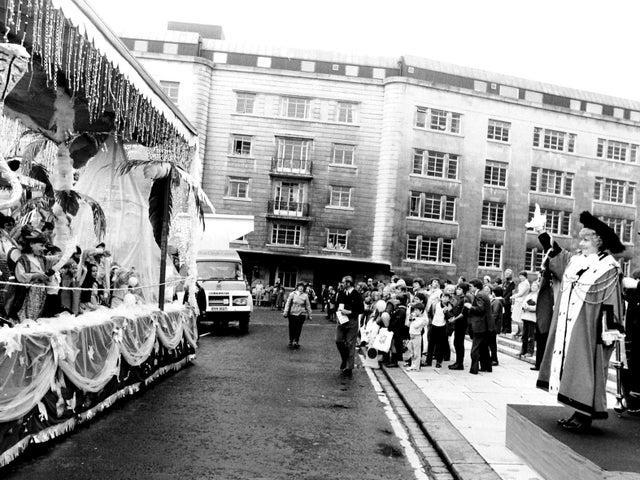 Lord Mayor of Leeds Coun Doreen Jenner salutes the 1st Sherburn in Elmet Brownies as they pass the Civic Hall in June 1982.