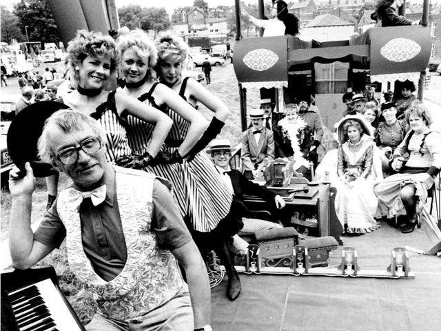 Showtime... staff from the Leeds Dragonara Hotel have fun on their eye-catching float uin June 1984.