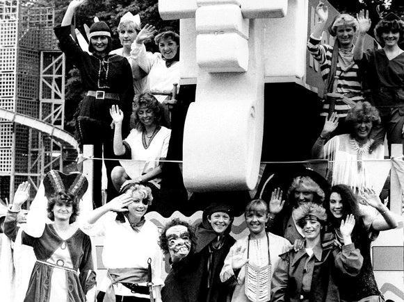 It's for you... hoo! The girls from British Telecom don various costumes from the firm's TV ads for their float in June 1985.